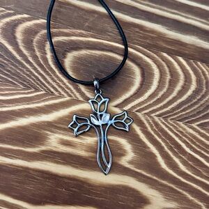 Rare HTF retired James Avery three tulip cross pendant.